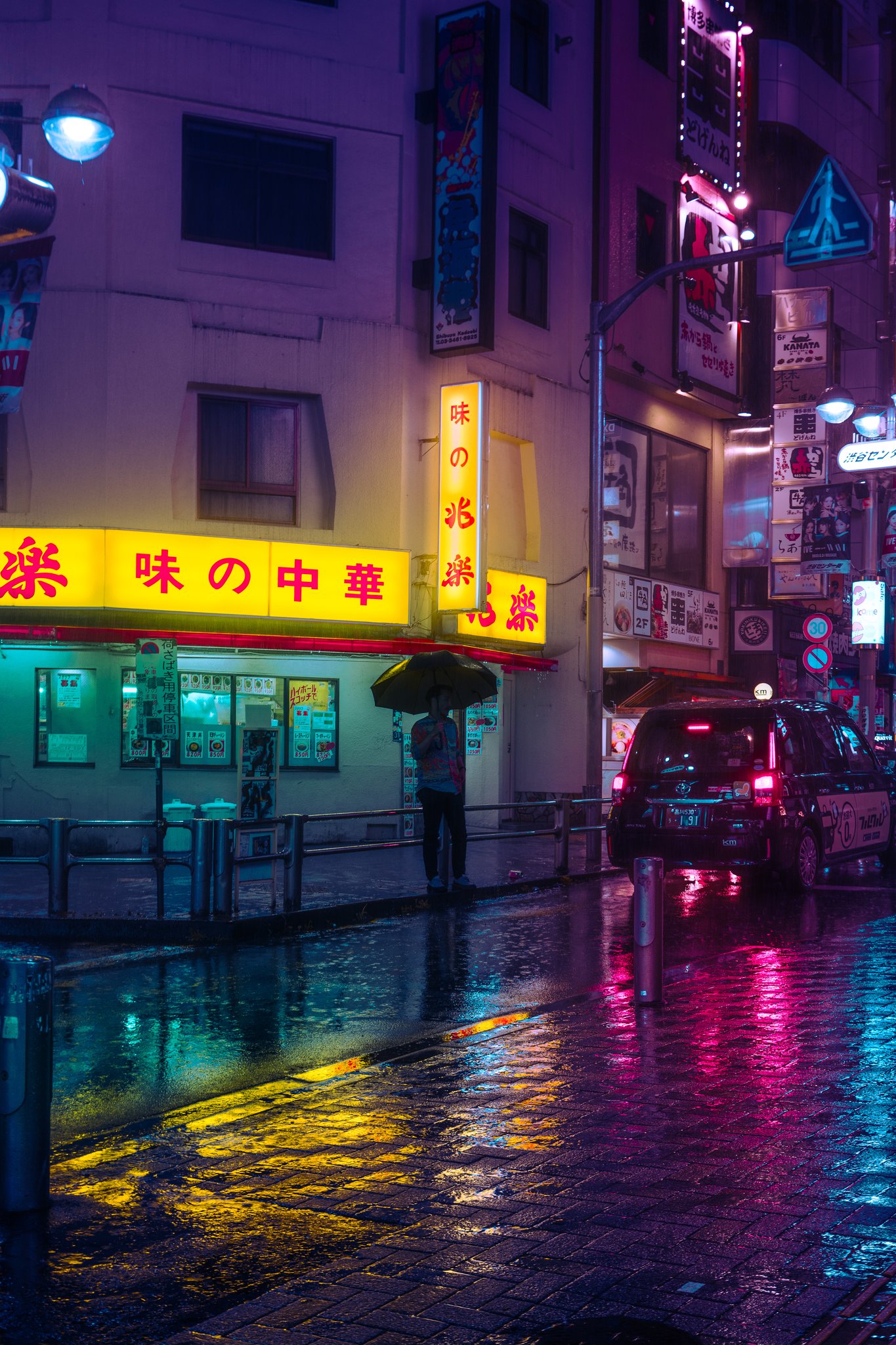 Tokyo night photography — Shinjuku rain umbrella neon street