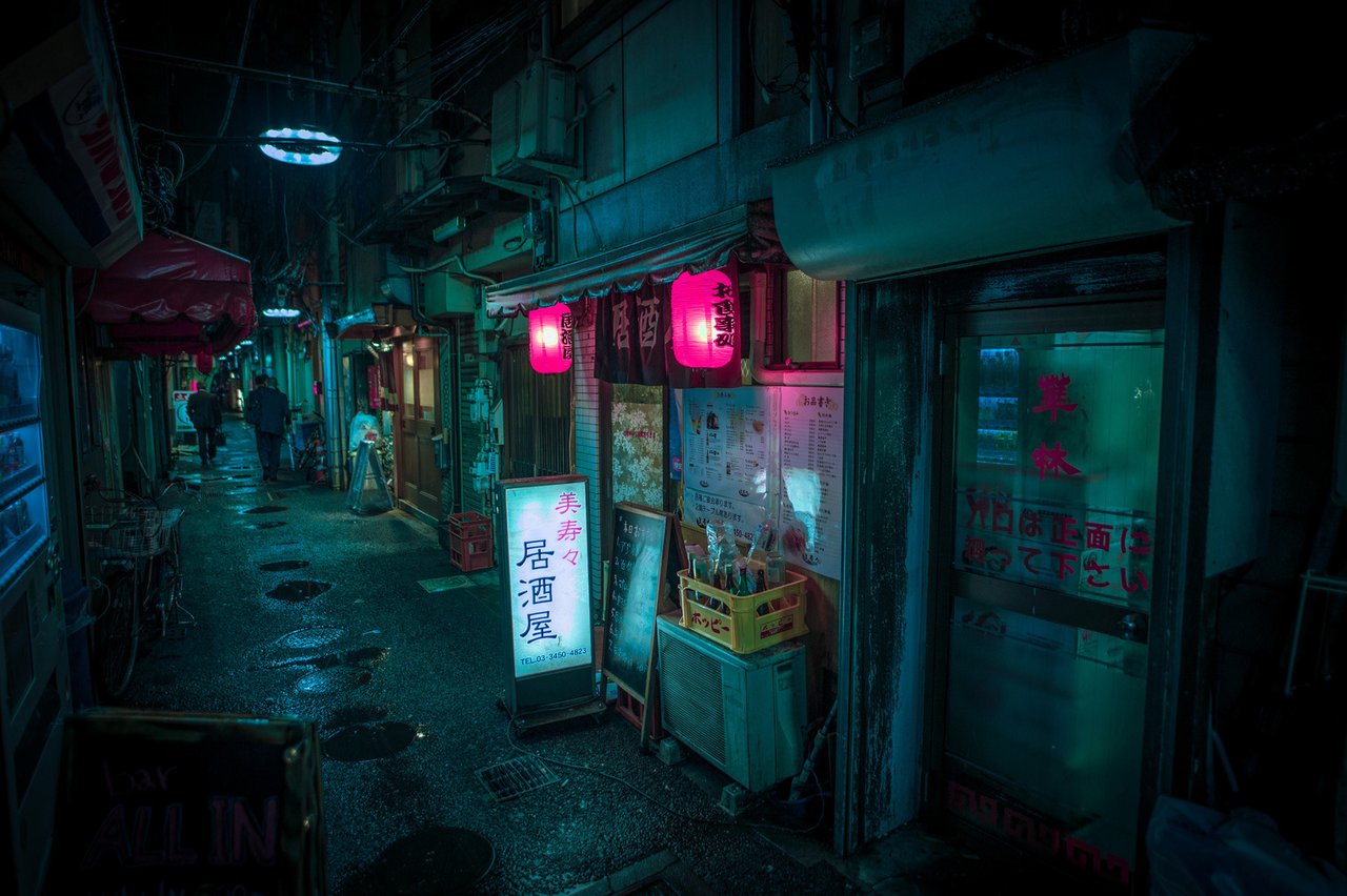 Tokyo hidden alley bar district at night
