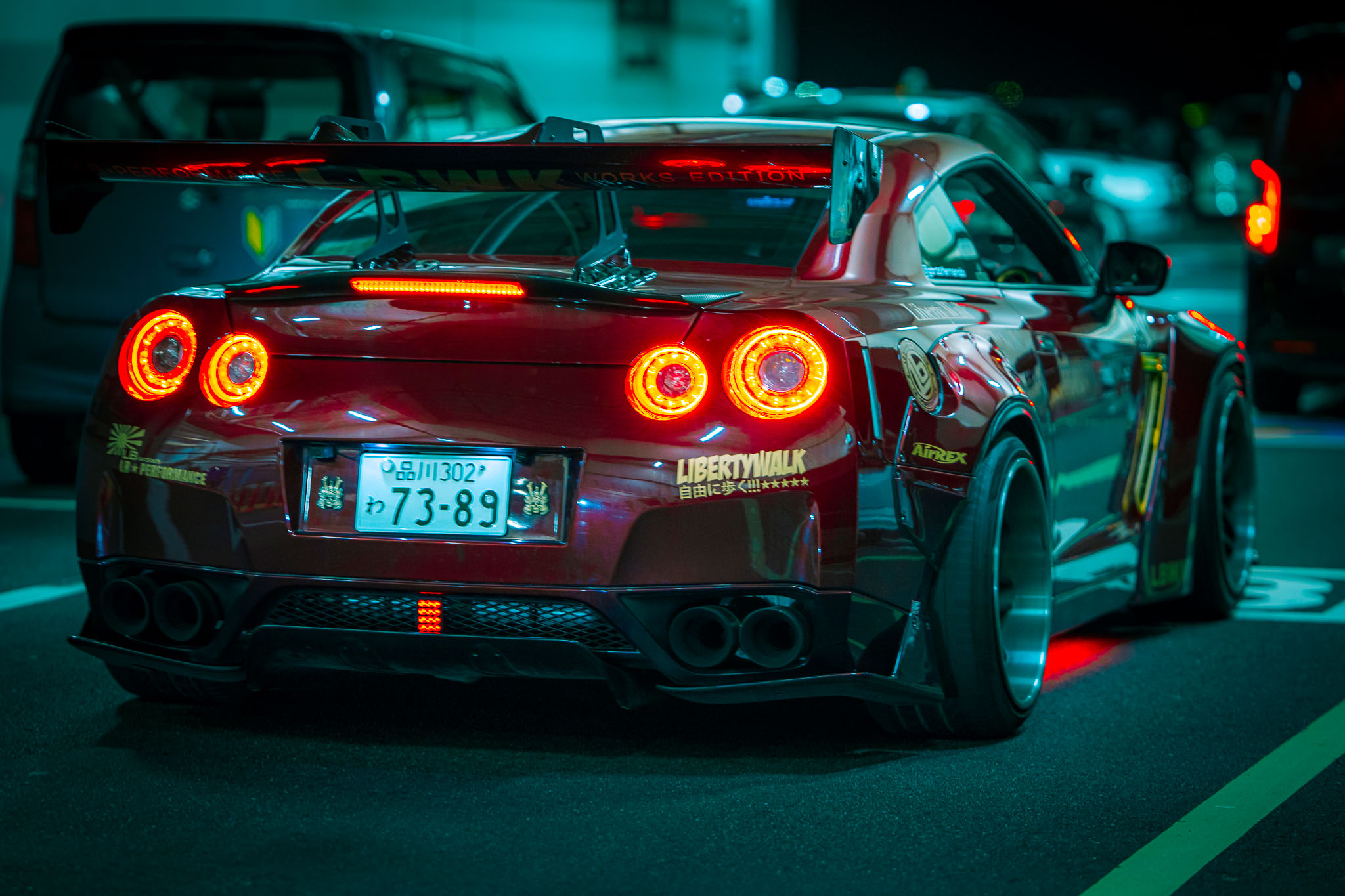 Liberty Walk Nissan GT-R R35 rear with glowing brake lights at Umi Hotaru