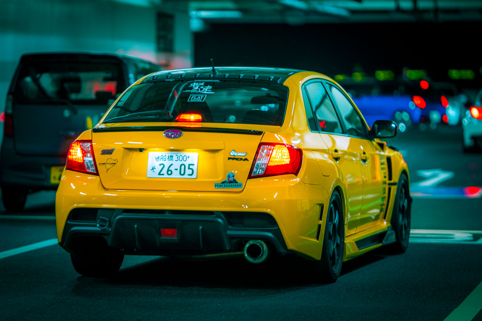 Yellow Subaru WRX STI rear at Umi Hotaru JDM car meet — Funabashi plate
