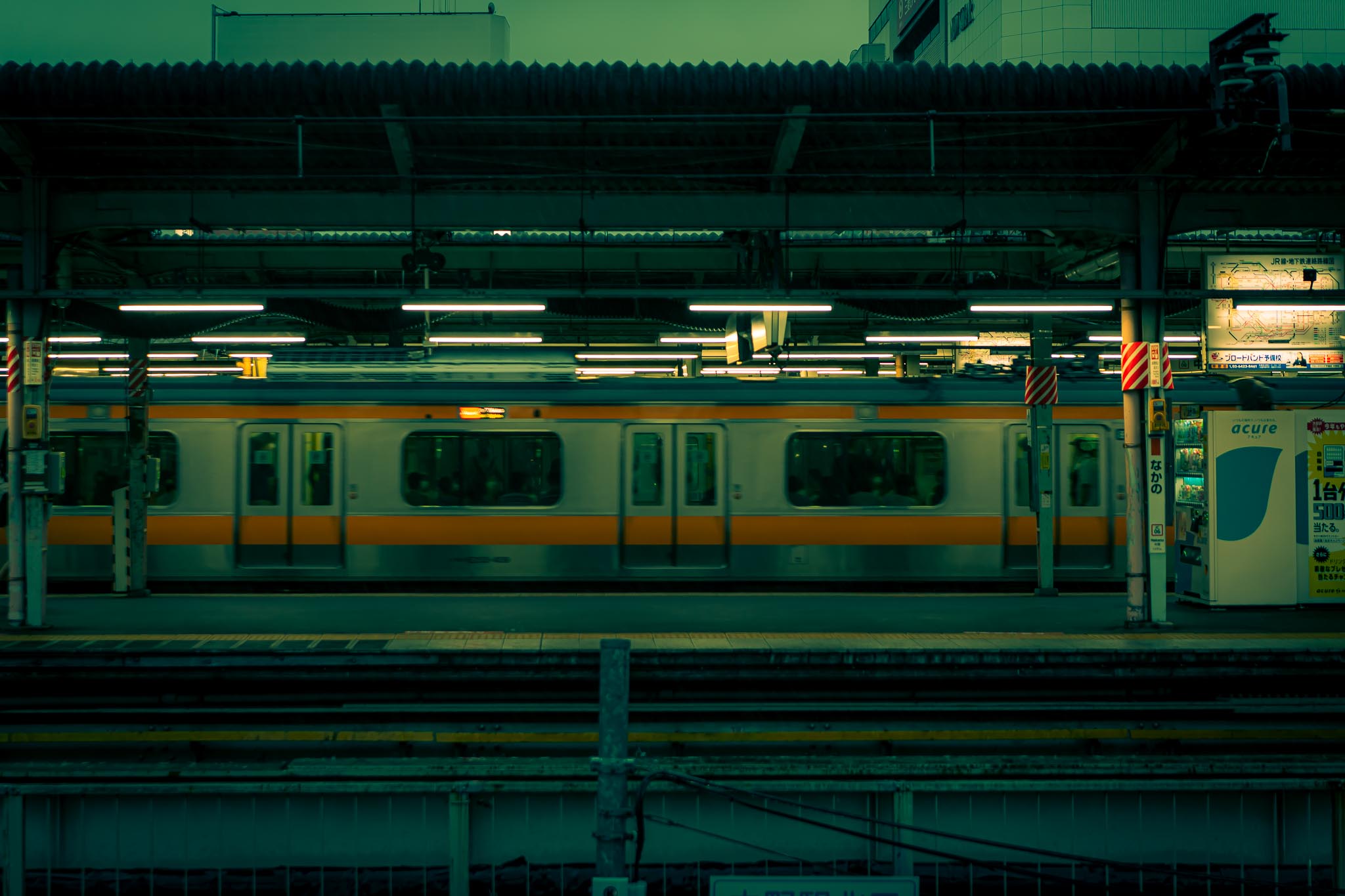 Nakano station platform — JR Chuo line train Tokyo