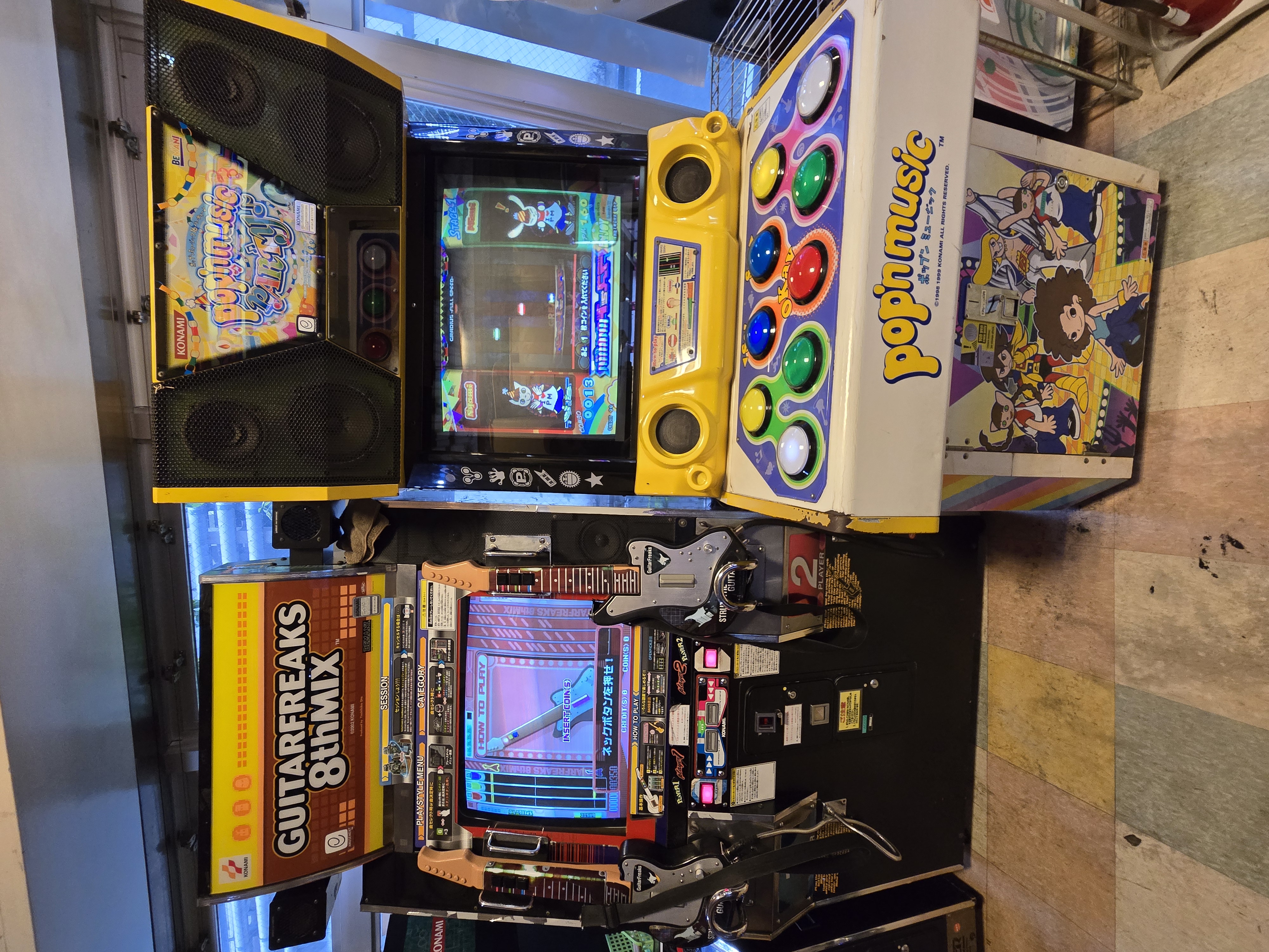 Pop'n Music and Guitar Freaks 8th Mix cabinets at Mikado Takadanobaba